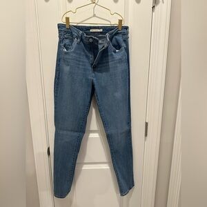 721 High Rise Skinny Jeans